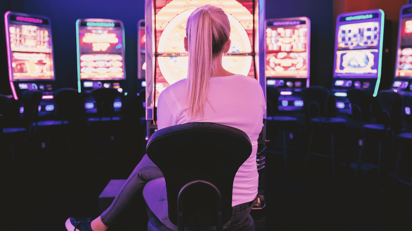 a person in front of slot machine