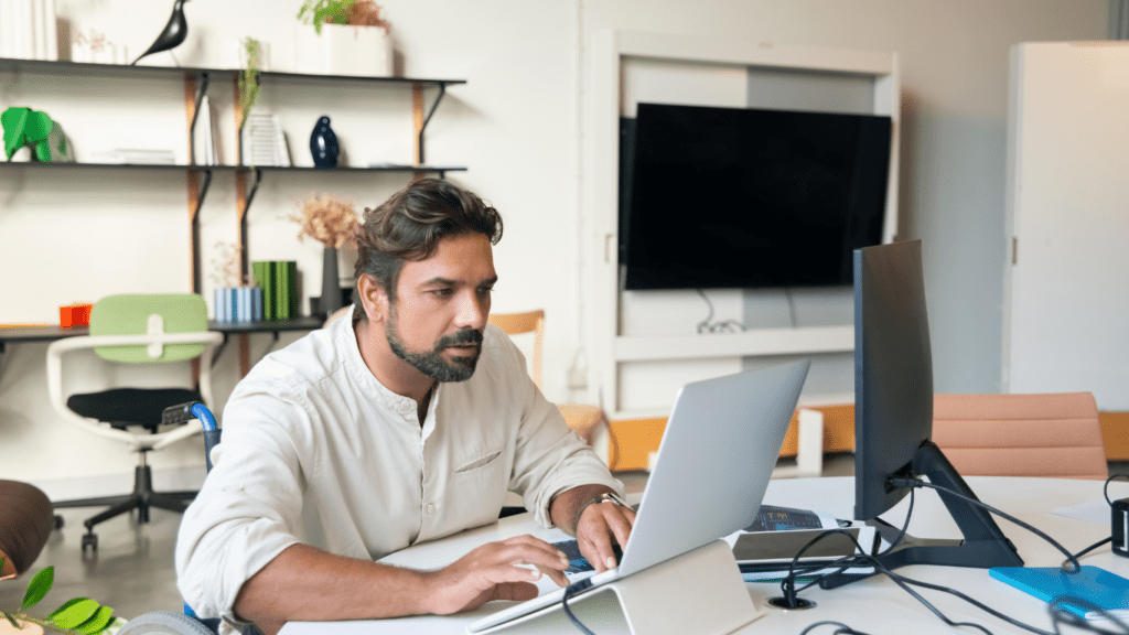 a person typing in the laptop
