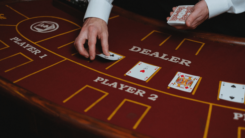 a person holding a deck of cards