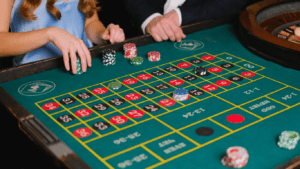 a person holding a casino chips