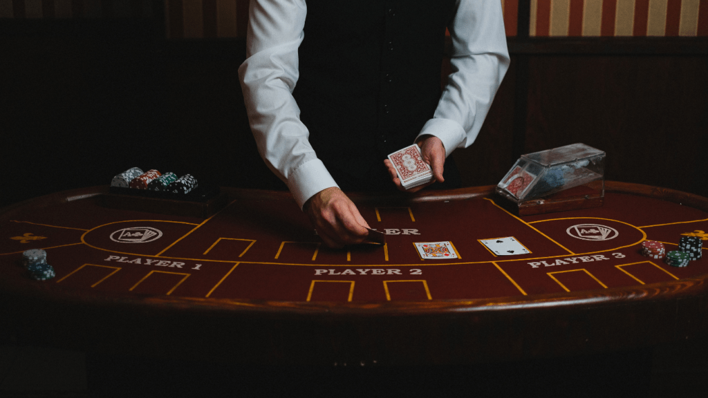 a person holding a deck of cards