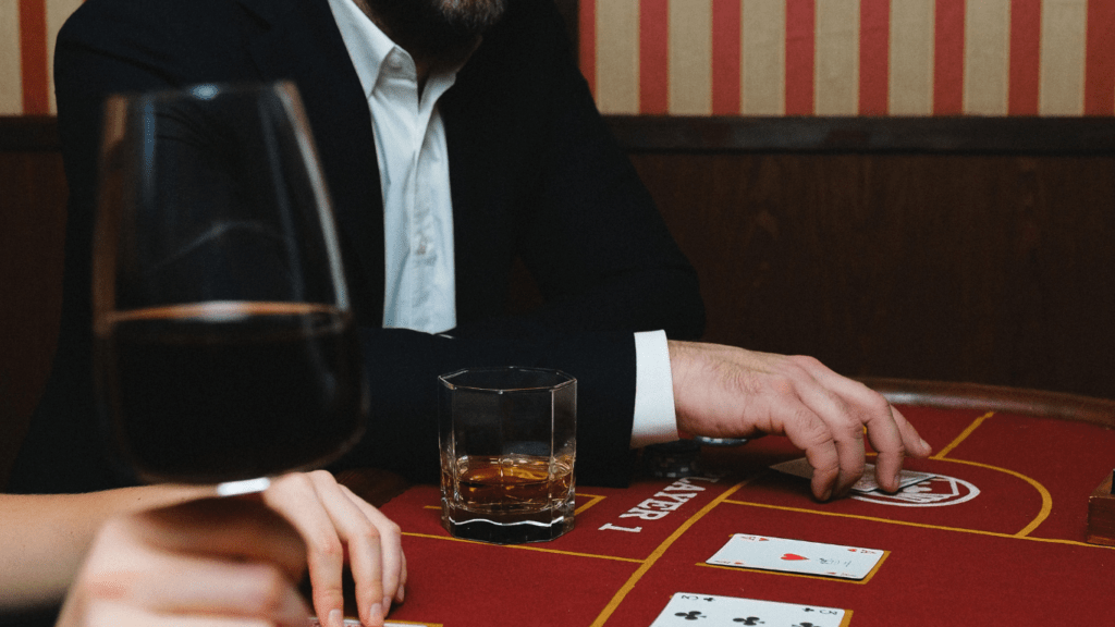 a person wearing a suit in the casino table